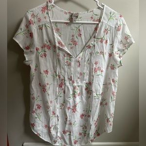 White shirt with pink floral pattern